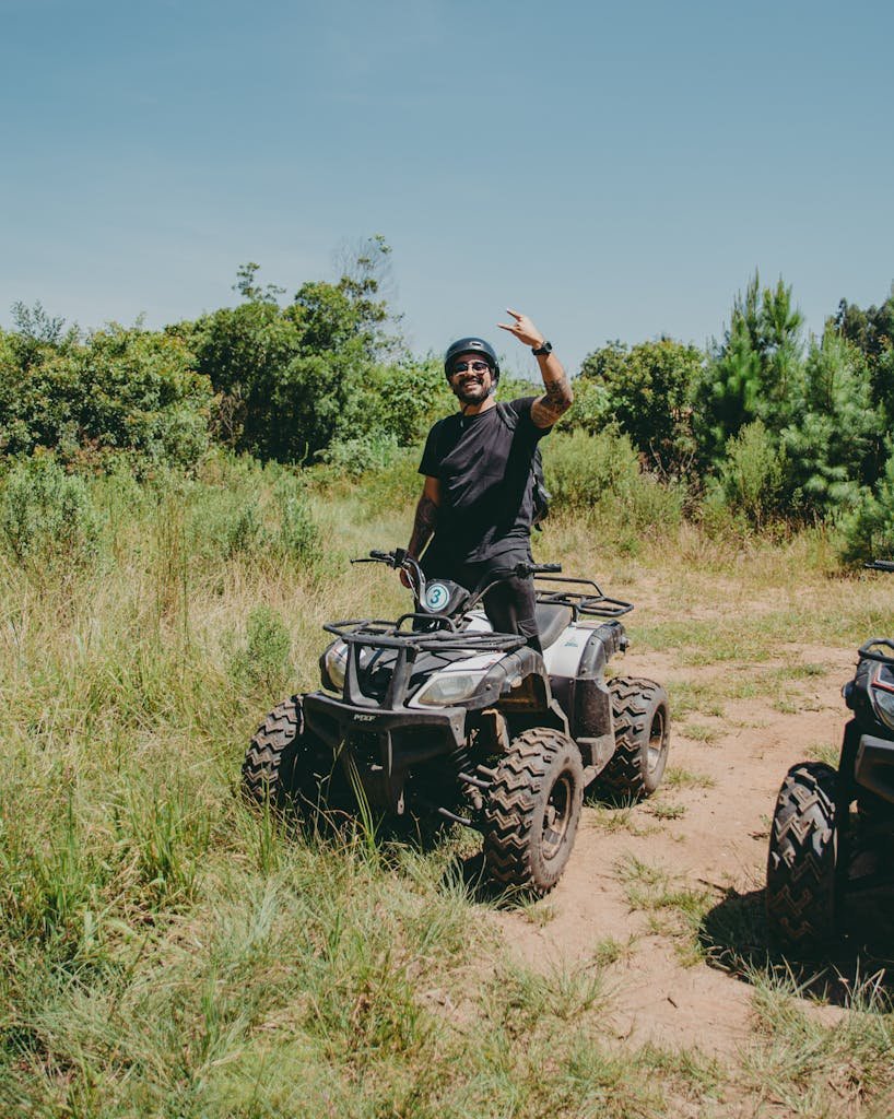 A Man Standing on the Quad Bike